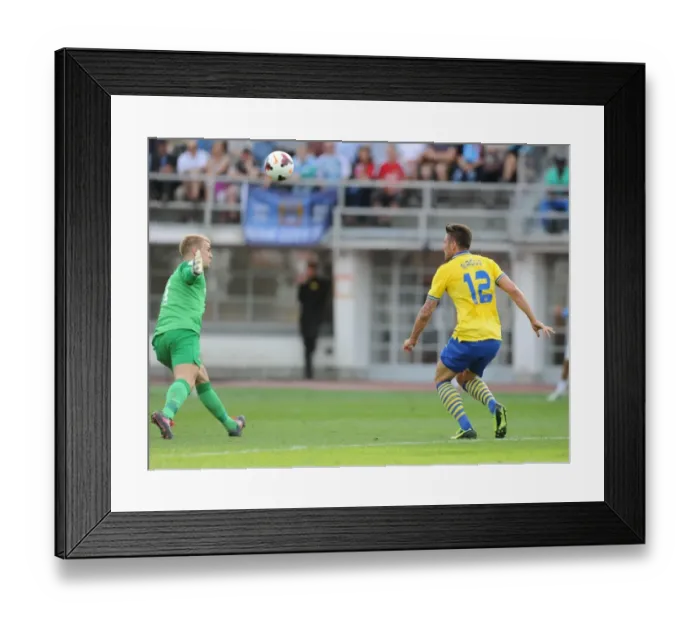 Framed Print : Olivier Giroud's Stunning Chip Over Joe Hart: Arsenal's Pre-Season Triumph over Manchester City (2013)