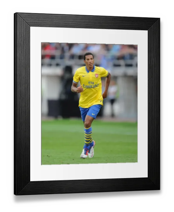 Framed Print : Issac Hayden in Action: Arsenal vs Manchester City Pre-Season Clash, Finland 2013