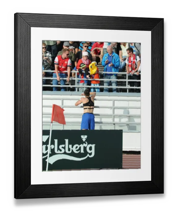Framed Print : Arsenal's Carl Jenkinson Shows Sportsmanship by Throwing Shirt to Ecstatic Fan after Arsenal vs. Manchester City Pre-Season Match, Helsinki 2013