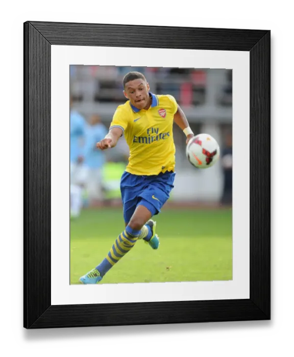 Framed Print : Alex Oxlade-Chamberlain in Action: Arsenal vs Manchester City Pre-Season Clash, 2013