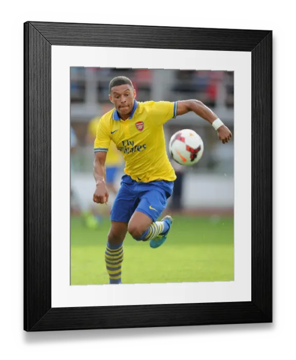 Framed Print : Arsenal's Alex Oxlade-Chamberlain Faces Manchester City in Pre-Season Friendly, 2013 Framed Print : Arsenal's Alex Oxlade-Chamberlain Faces Manchester City in Pre-Season Friendly, 2013