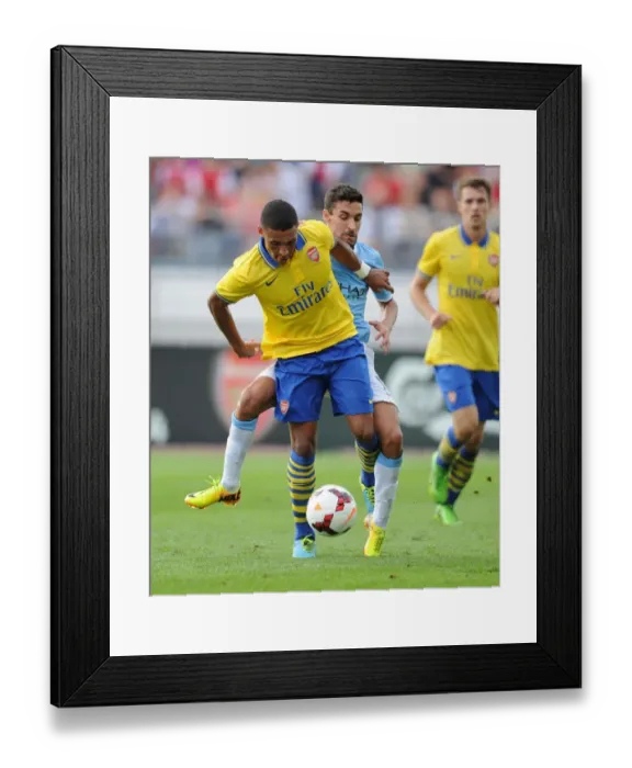 Framed Print : Arsenal's Alex Oxlade-Chamberlain vs. Manchester City's Jesus Navas: Pre-Season Clash in Helsinki, Finland (August 2013) Framed Print : Arsenal's Alex Oxlade-Chamberlain vs. Manchester City's Jesus Navas: Pre-Season Clash in Helsinki, Finland (August 2013)