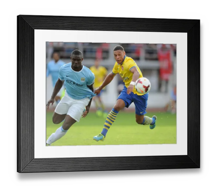 Framed Print : Arsenal's Oxlade-Chamberlain vs. Richards: A Pre-Season Battle in Helsinki