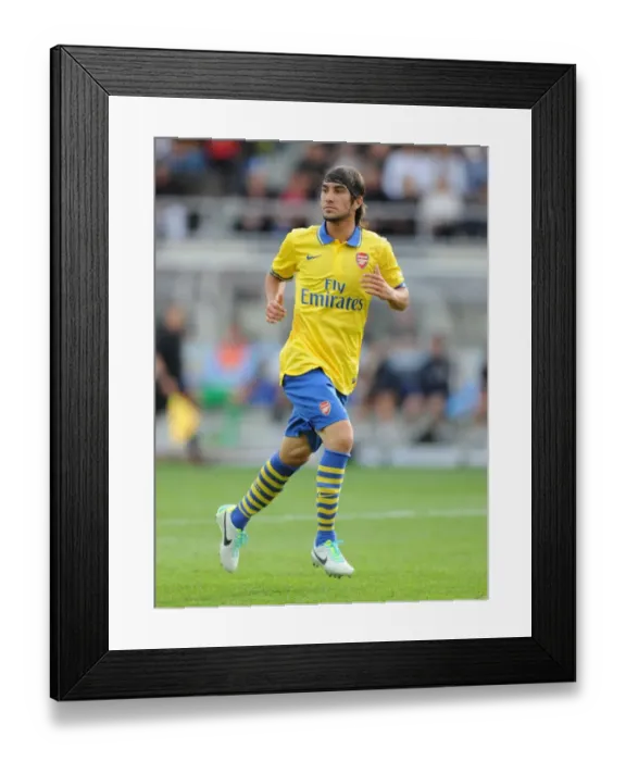 Framed Print : Arsenal's Sebastien Perez Faces Off Against Manchester City in 2013 Pre-Season Friendly Framed Print : Arsenal's Sebastien Perez Faces Off Against Manchester City in 2013 Pre-Season Friendly