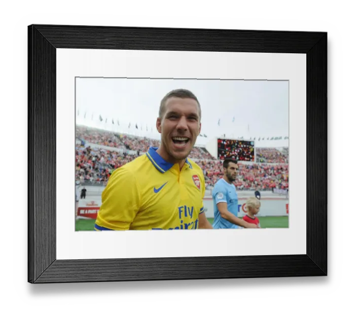 Framed Print : Lukas Podolski: Arsenal's Star Forward Prepares for Manchester City Clash in Helsinki (2013) Framed Print : Lukas Podolski: Arsenal's Star Forward Prepares for Manchester City Clash in Helsinki (2013)
