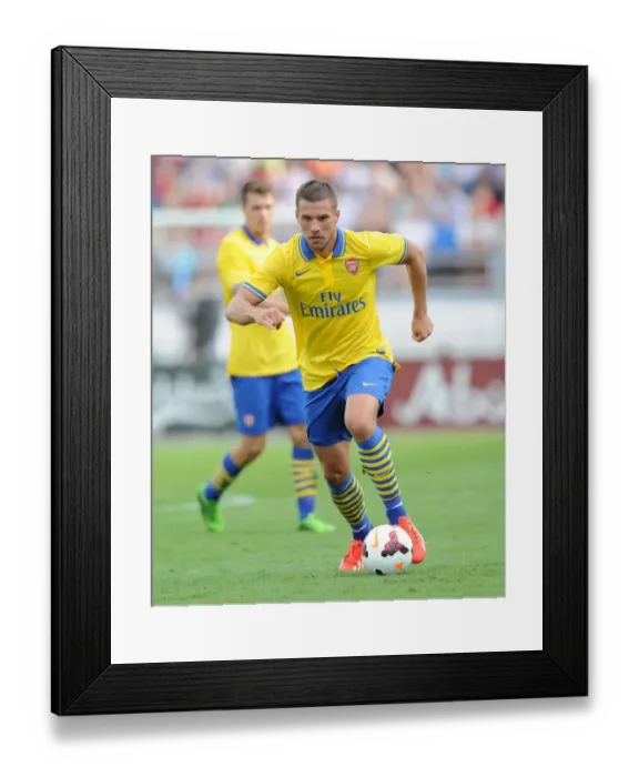 Framed Print : Lukas Podolski in Action: Arsenal vs Manchester City Pre-Season Clash, 2013