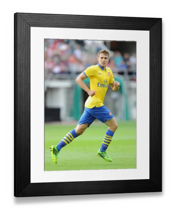 Framed Print : Arsenal's Aaron Ramsey Faces Manchester City in Pre-Season Friendly, Finland 2013 Framed Print : Arsenal's Aaron Ramsey Faces Manchester City in Pre-Season Friendly, Finland 2013