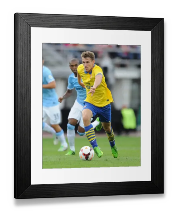 Framed Print : Arsenal's Aaron Ramsey Faces Manchester City in 2013: Pre-Season Clash in Helsinki Framed Print : Arsenal's Aaron Ramsey Faces Manchester City in 2013: Pre-Season Clash in Helsinki