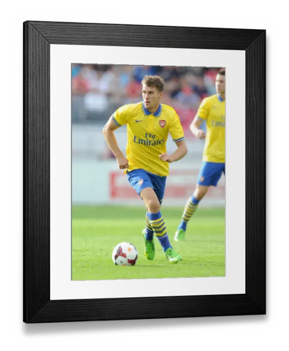 Framed Print : Arsenal's Aaron Ramsey Faces Off Against Manchester City in 2013 Pre-Season Showdown Framed Print : Arsenal's Aaron Ramsey Faces Off Against Manchester City in 2013 Pre-Season Showdown