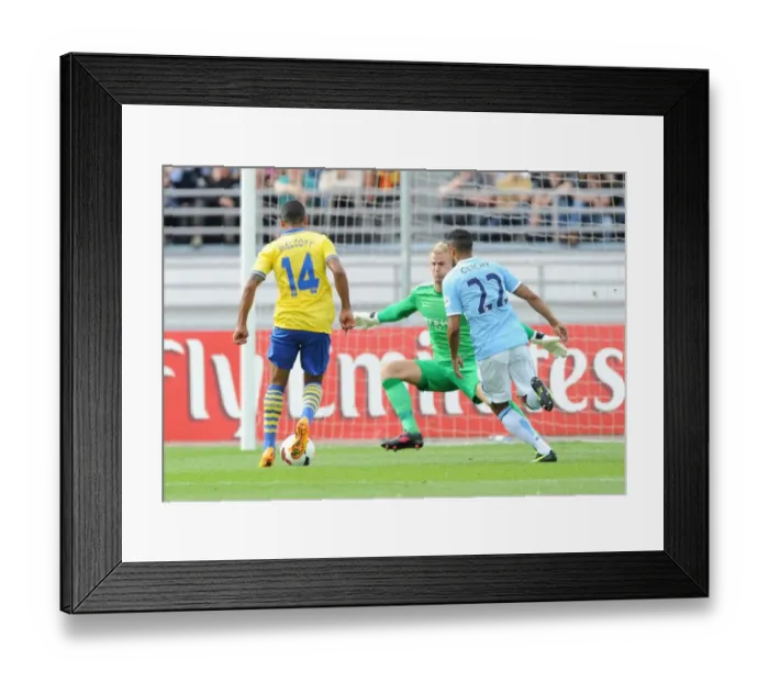 Framed Print : Theo Walcott Scores the Opener: Arsenal vs. Manchester City (2013) - Chipping Over Joe Hart Framed Print : Theo Walcott Scores the Opener: Arsenal vs. Manchester City (2013) - Chipping Over Joe Hart