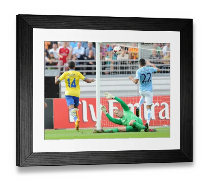 Framed Print : Theo Walcott Scores the First Goal: Arsenal vs. Manchester City (2013) - Chipping Over Joe Hart Framed Print : Theo Walcott Scores the First Goal: Arsenal vs. Manchester City (2013) - Chipping Over Joe Hart