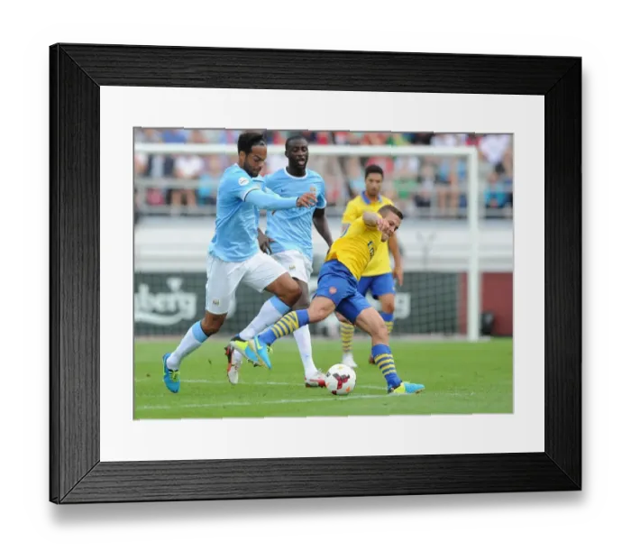 Framed Print : Clash of Midfield Titans: Wilshere vs. Toure & Lescott - Arsenal vs. Manchester City Pre-Season 2013-14 Framed Print : Clash of Midfield Titans: Wilshere vs. Toure & Lescott - Arsenal vs. Manchester City Pre-Season 2013-14