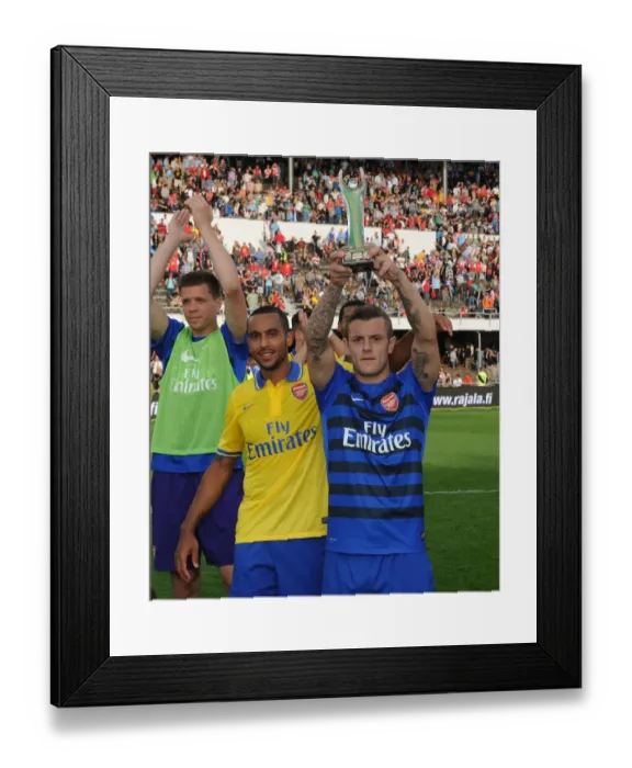 Framed Print : Arsenal's Theo Walcott and Jack Wilshere Share a Moment After Arsenal vs. Manchester City Pre-Season Friendly in Helsinki, 2013 Framed Print : Arsenal's Theo Walcott and Jack Wilshere Share a Moment After Arsenal vs. Manchester City Pre-Season Friendly in Helsinki, 2013
