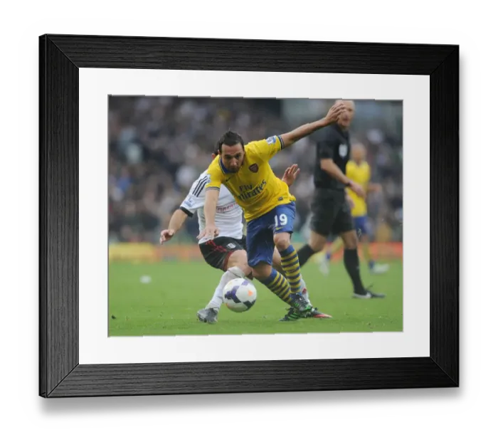 Framed Print : Santi Cazorla: Arsenal's Midfield Maestro in Action against Fulham, Premier League 2013-14