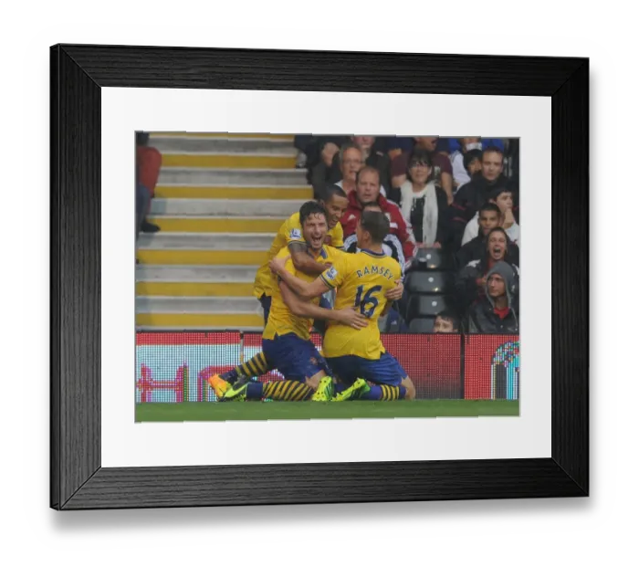 Framed Print : Arsenal's Triumphant Threesome: Giroud, Walcott, Ramsey Celebrate First Goal vs. Fulham (2013-14)