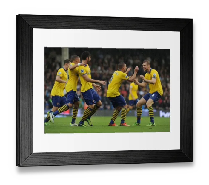 Framed Print : Podolski and Mertesacker Celebrate Arsenal's Second Goal Against Fulham (2013-14)