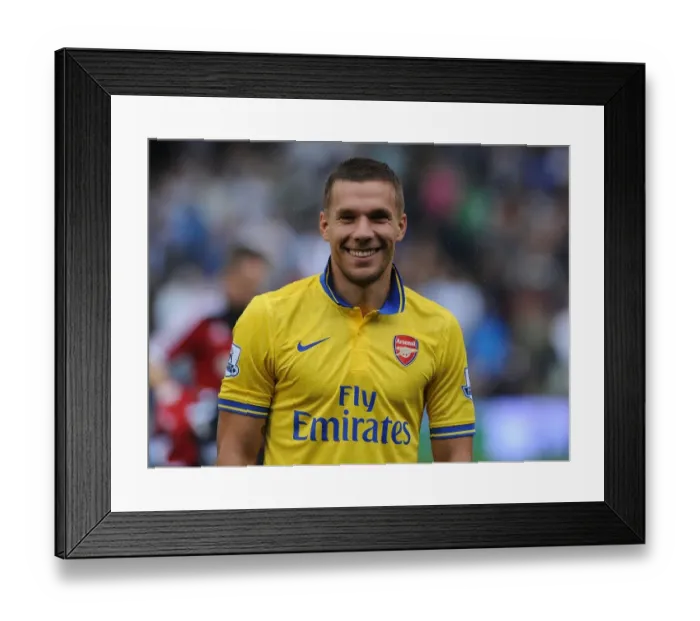 Framed Print : Lukas Podolski: Arsenal Star's Focus Before Fulham Clash (2013-14)