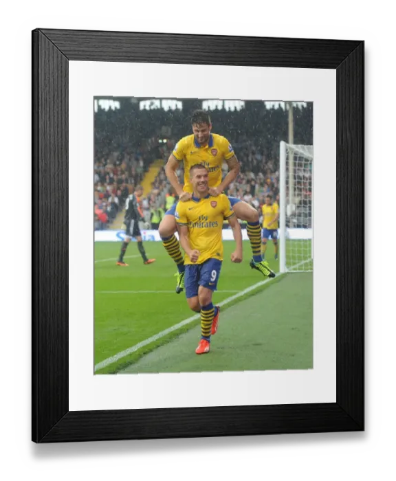 Framed Print : Podolski and Giroud's Euphoric Moment: Arsenal's Third Goal Against Fulham (2013-14) Framed Print : Podolski and Giroud's Euphoric Moment: Arsenal's Third Goal Against Fulham (2013-14)