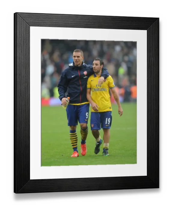 Framed Print : Podolski and Cazorla Celebrate Arsenal's Victory over Fulham (2013-14) Framed Print : Podolski and Cazorla Celebrate Arsenal's Victory over Fulham (2013-14)