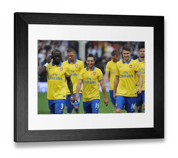Framed Print : Arsenal Trio: Sagna, Cazorla, Ramsey Pre-Match Huddle vs. Fulham (2013-14)