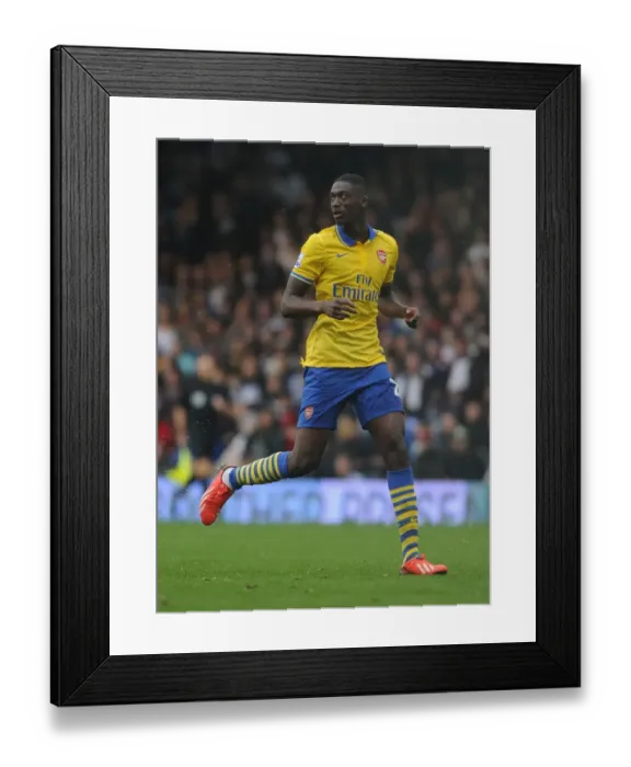 Framed Print : Yaya Sanogo in Action: Fulham vs. Arsenal, Premier League 2013-14