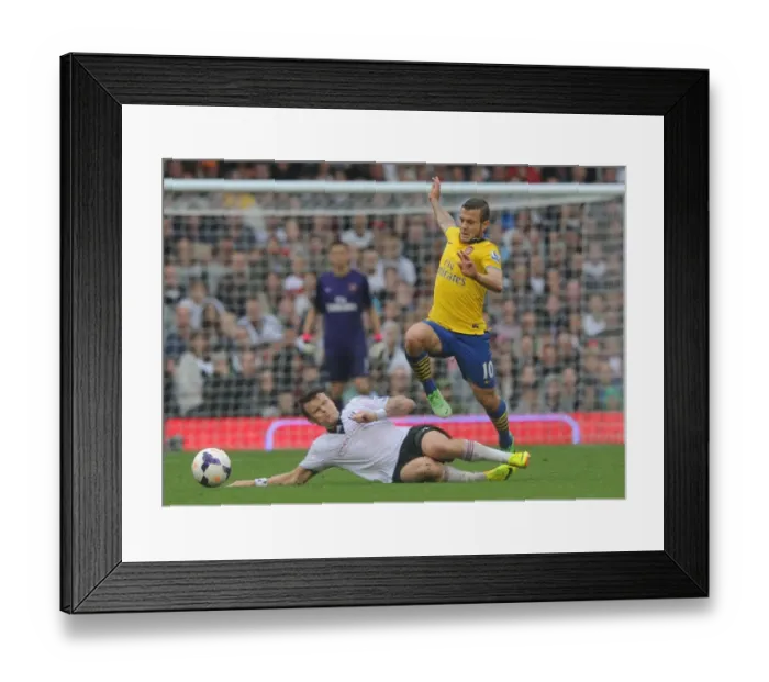 Framed Print : Jack Wilshere vs John Arne Riise: Battle at Craven Cottage, Fulham vs Arsenal, Premier League 2013-14