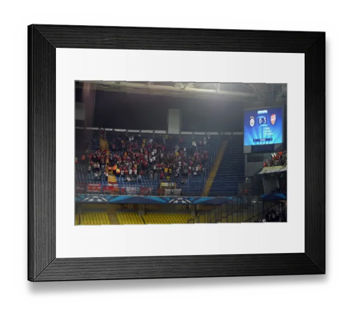 Framed Print : Arsenal Fans Celebrate Third Goal Against Fenerbahce in UEFA Champions League Play-offs Framed Print : Arsenal Fans Celebrate Third Goal Against Fenerbahce in UEFA Champions League Play-offs