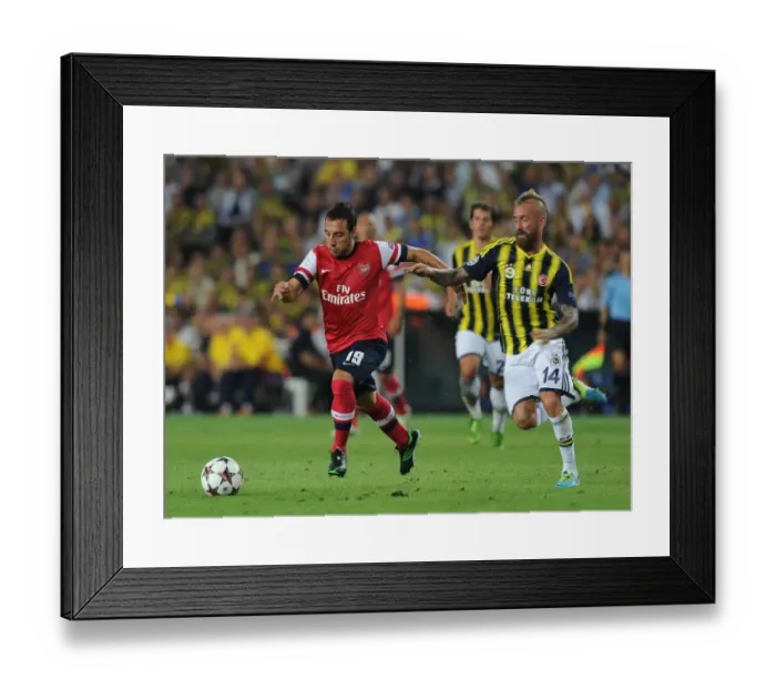 Framed Print : Santi Cazorla Outmaneuvers Raul Meireles: Arsenal vs. Fenerbahce, UEFA Champions League Play-offs (2013) Framed Print : Santi Cazorla Outmaneuvers Raul Meireles: Arsenal vs. Fenerbahce, UEFA Champions League Play-offs (2013)