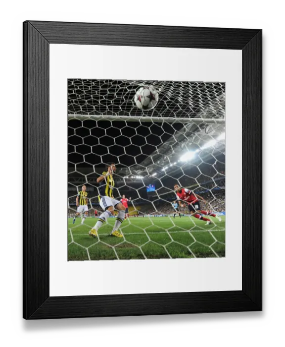 Framed Print : Arsenal's Kieran Gibbs Scores First Goal in UEFA Champions League Play-offs against Fenerbahce