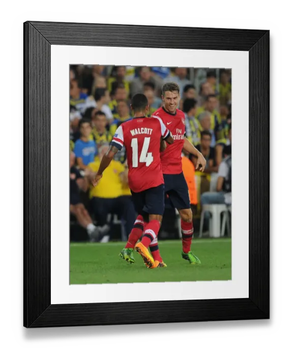 Framed Print : Aaron Ramsey and Theo Walcott Celebrate Goals: Arsenal's Dominance over Fenerbahce in 2013-14 UEFA Champions League Play-offs