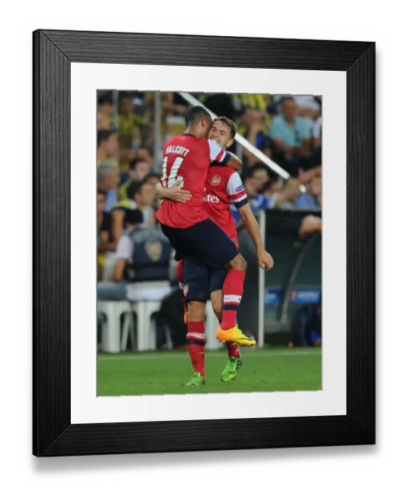Framed Print : Ramsey and Walcott Celebrate Arsenal's Third Goal vs. Fenerbahce in 2013 Champions League Play-offs