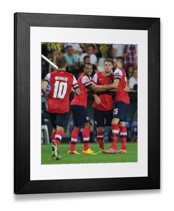 Framed Print : Arsenal's Aaron Ramsey, Jack Wilshere, Theo Walcott and Carl Jenkinson Celebrate Goals Against Fenerbahce in UEFA Champions League Play-offs Framed Print : Arsenal's Aaron Ramsey, Jack Wilshere, Theo Walcott and Carl Jenkinson Celebrate Goals Against Fenerbahce in UEFA Champions League Play-offs