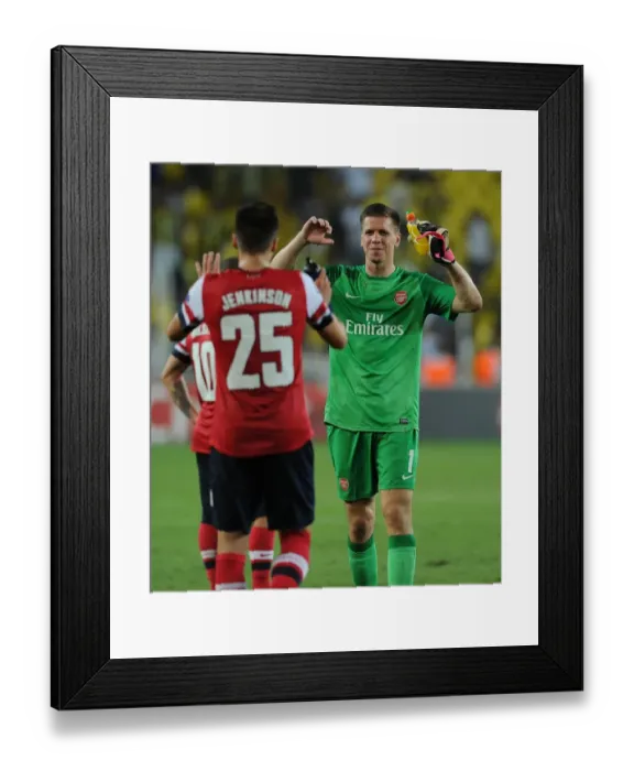 Framed Print : Arsenal Celebrate First Leg Victory over Fenerbahce: Wojciech Szczesny and Carl Jenkinson
