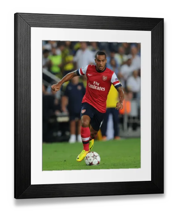Framed Print : Theo Walcott in Action: Arsenal vs. Fenerbahce, UEFA Champions League Play-offs (2013)