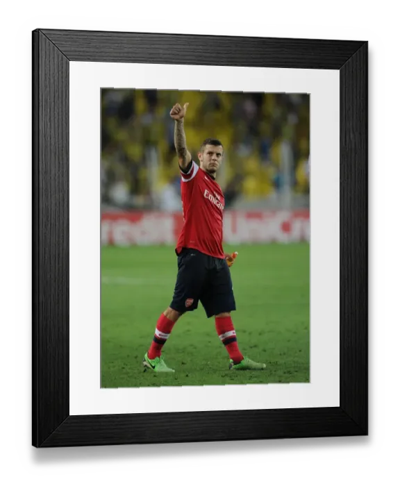 Framed Print : Jack Wilshere Celebrates with Arsenal Fans after First Leg of Fenerbahce vs Arsenal, UEFA Champions League Play-offs (2013) Framed Print : Jack Wilshere Celebrates with Arsenal Fans after First Leg of Fenerbahce vs Arsenal, UEFA Champions League Play-offs (2013)