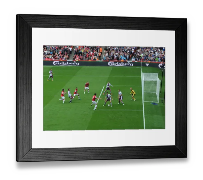 Framed Print : Arsenal vs Aston Villa: Premier League Showdown at Emirates Stadium with Carlsberg Ads