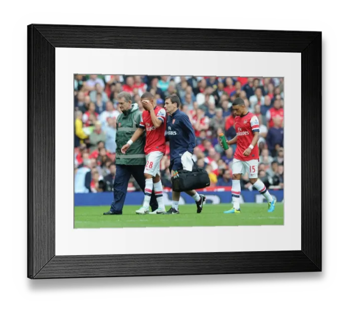 Framed Print : Arsenal: Injured Doctor Kieran Gibbs Tended by Medical Team During Arsenal v Aston Villa Match, 2013-14