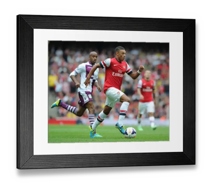 Framed Print : Arsenal's Alex Oxlade-Chamberlain Outmaneuvers Aston Villa's Fabian Delph