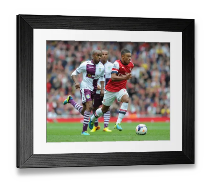 Framed Print : Alex Oxlade-Chamberlain's Dribbling Masterclass: Outsmarting Fabian Delph for Arsenal Against Aston Villa, 2013