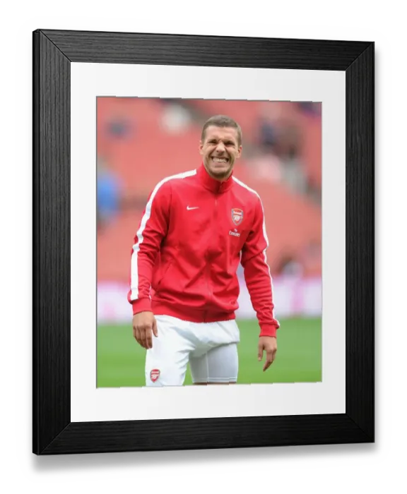 Framed Print : Arsenal's Lukas Podolski Readies for Arsenal v Aston Villa Clash (2013-14 Premier League) Framed Print : Arsenal's Lukas Podolski Readies for Arsenal v Aston Villa Clash (2013-14 Premier League)