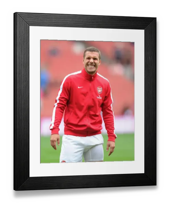 Framed Print : Arsenal's Ready Striker: Lukas Podolski Gears Up Against Aston Villa (2013-14) Framed Print : Arsenal's Ready Striker: Lukas Podolski Gears Up Against Aston Villa (2013-14)