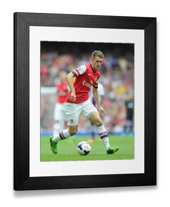 Framed Print : Arsenal's Aaron Ramsey in Action Against Aston Villa (2013-14 Premier League) Framed Print : Arsenal's Aaron Ramsey in Action Against Aston Villa (2013-14 Premier League)