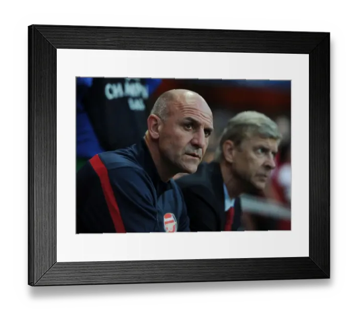 Framed Print : Steve Bould: Focused at the Emirates - Arsenal FC vs Fenerbahce SK, UEFA Champions League Play-offs (2013)