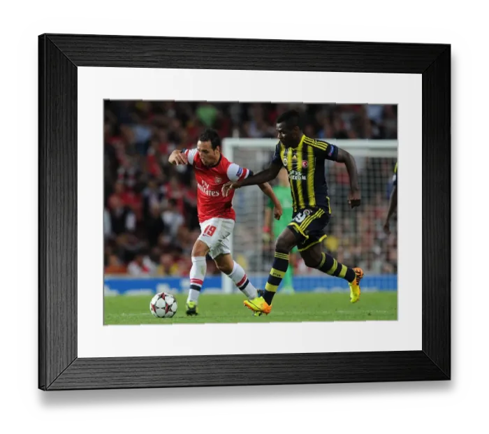 Framed Print : Santi Cazorla Outmaneuvers Emmanuel Emenike: Arsenal vs Fenerbahce UEFA Champions League Play-offs Framed Print : Santi Cazorla Outmaneuvers Emmanuel Emenike: Arsenal vs Fenerbahce UEFA Champions League Play-offs