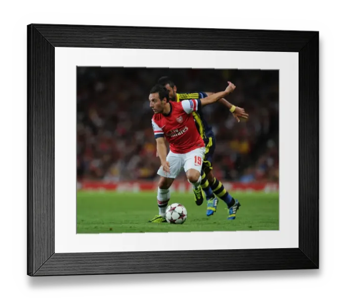 Framed Print : Santi Cazorla's Brilliant Outsmarting of Selcuk Sahin: Arsenal's UEFA Champions League Victory (August 2013)