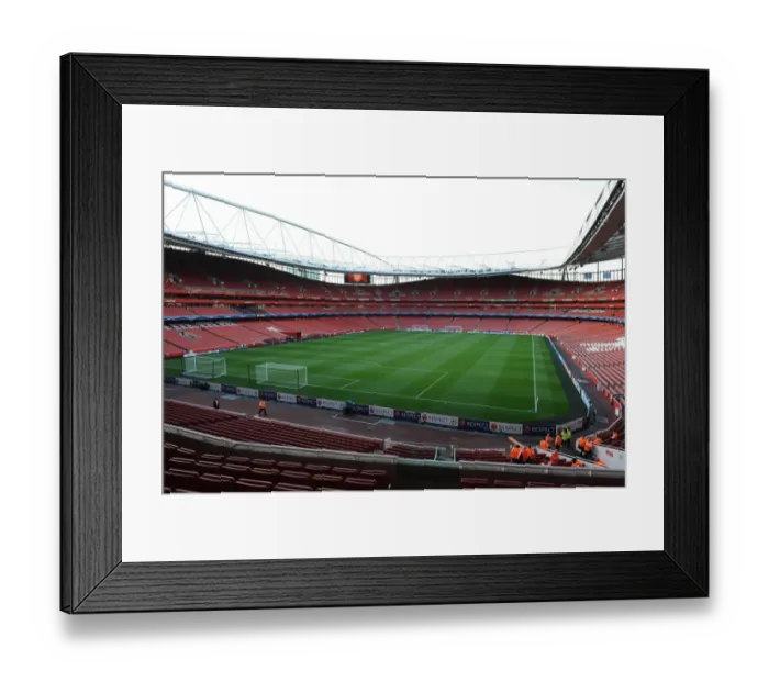 Framed Print : Arsenal vs Fenerbahce: UEFA Champions League Play-offs at Emirates Stadium (2013-14)