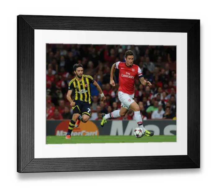 Framed Print : Olivier Giroud vs. Gokhan Gonul: Arsenal's Edge in Champions League Showdown (Arsenal v Fenerbahce 2013-14)