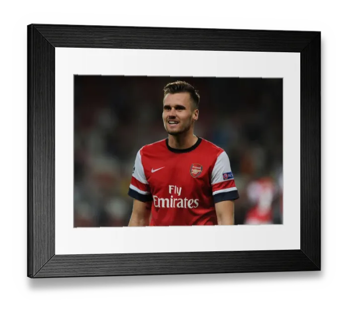 Framed Print : Carl Jenkinson: Arsenal's Defensive Determination in the 2013-14 UEFA Champions League Play-offs vs Fenerbahce