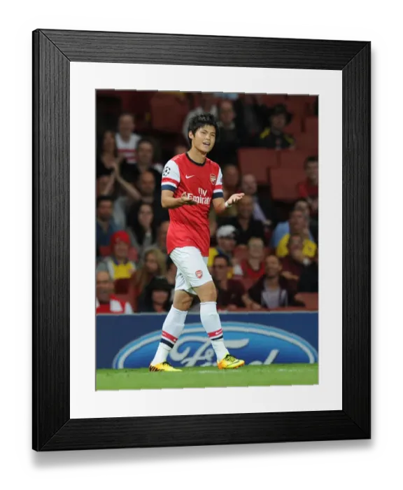 Framed Print : Arsenal's Roy Miyaichi in Action against Fenerbahce in 2013-14 UEFA Champions League Play-offs