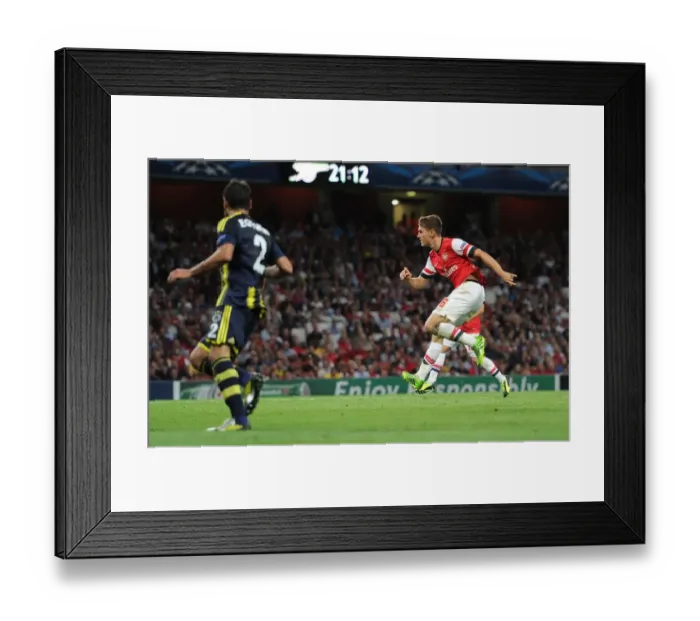 Framed Print : Aaron Ramsey Scores Past Volkan Demirel: Arsenal's Victory in Champions League Play-offs vs Fenerbahce (2013)